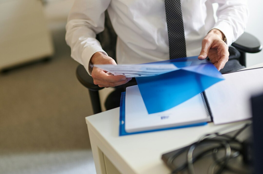 real estate agent with documents