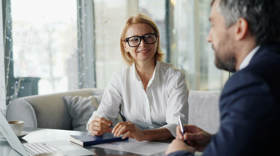 real estate agent with client